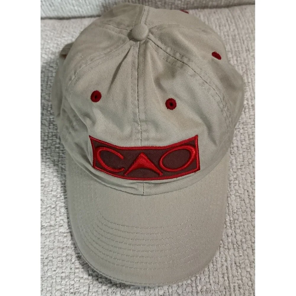 CAO Cigars Hat Cap Adjustable leather strap‎ metal buckle Beige Red accent.